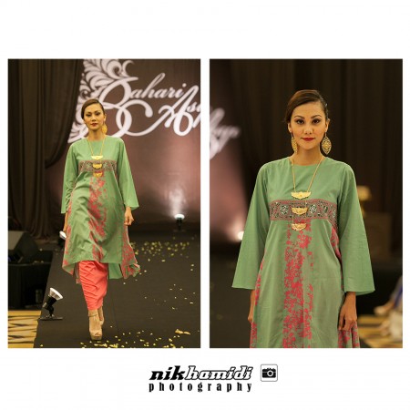 Kurung Tun Teja dari material Swiss cotton dengan embroideri di dada